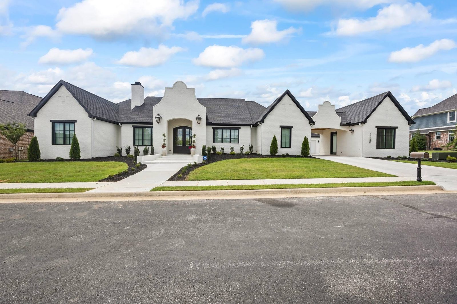 Painted white brick exterior with limewashed texture